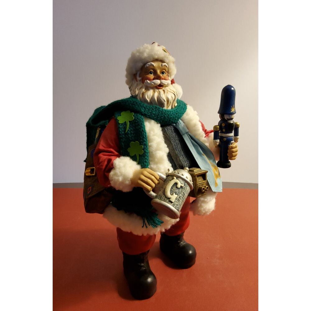 International tourist Santa figurine 11 inches tall